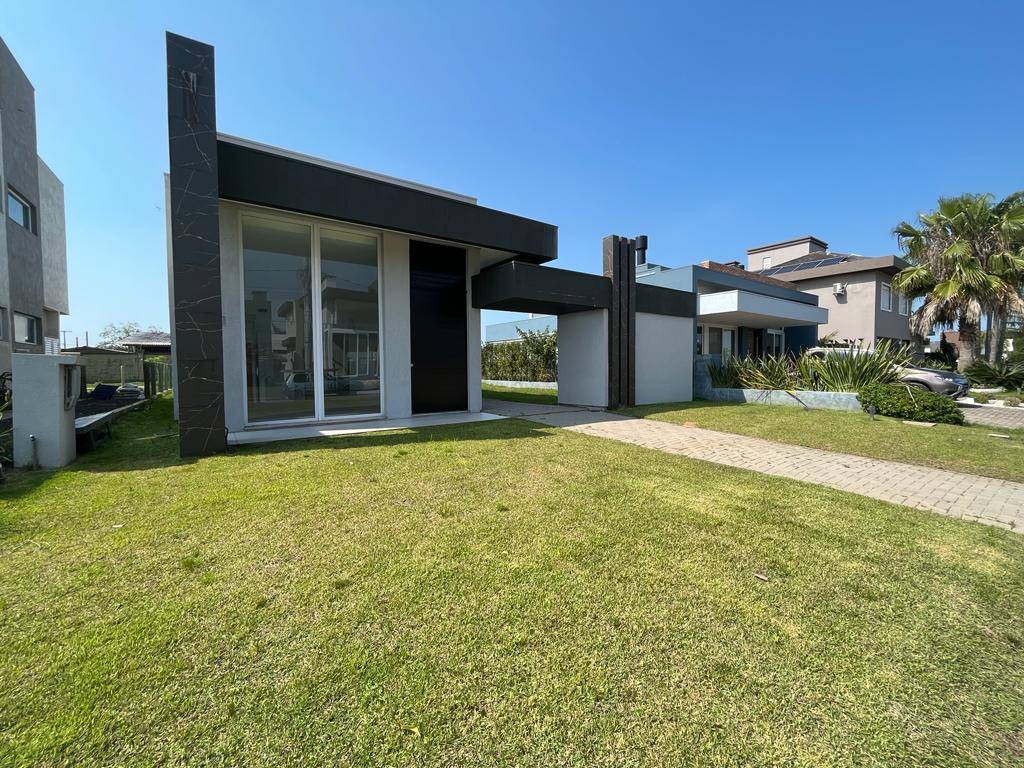 Casa em Condomínio 4 dormitórios para venda, Araça em Capão da Canoa | Ref.: 13317