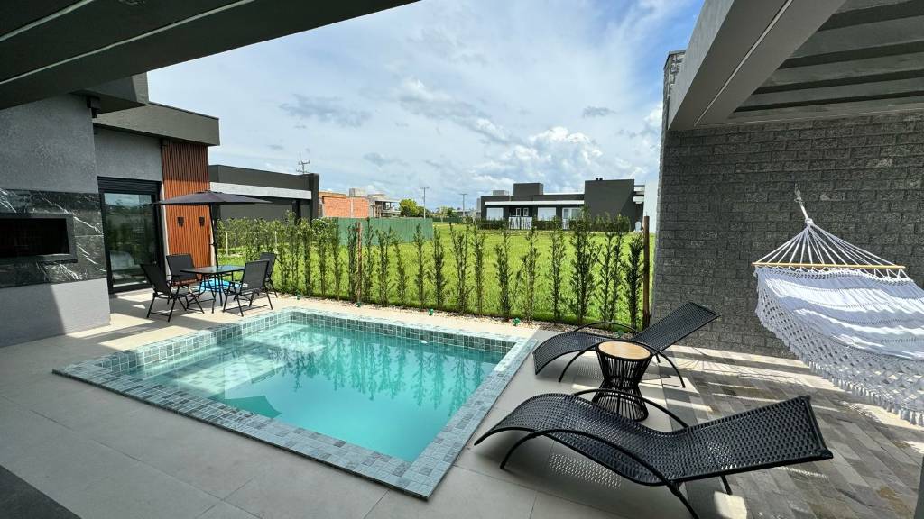 Casa em Condomínio 4 dormitórios para venda, Arroio Teixeira em Capão da Canoa | Ref.: 15285